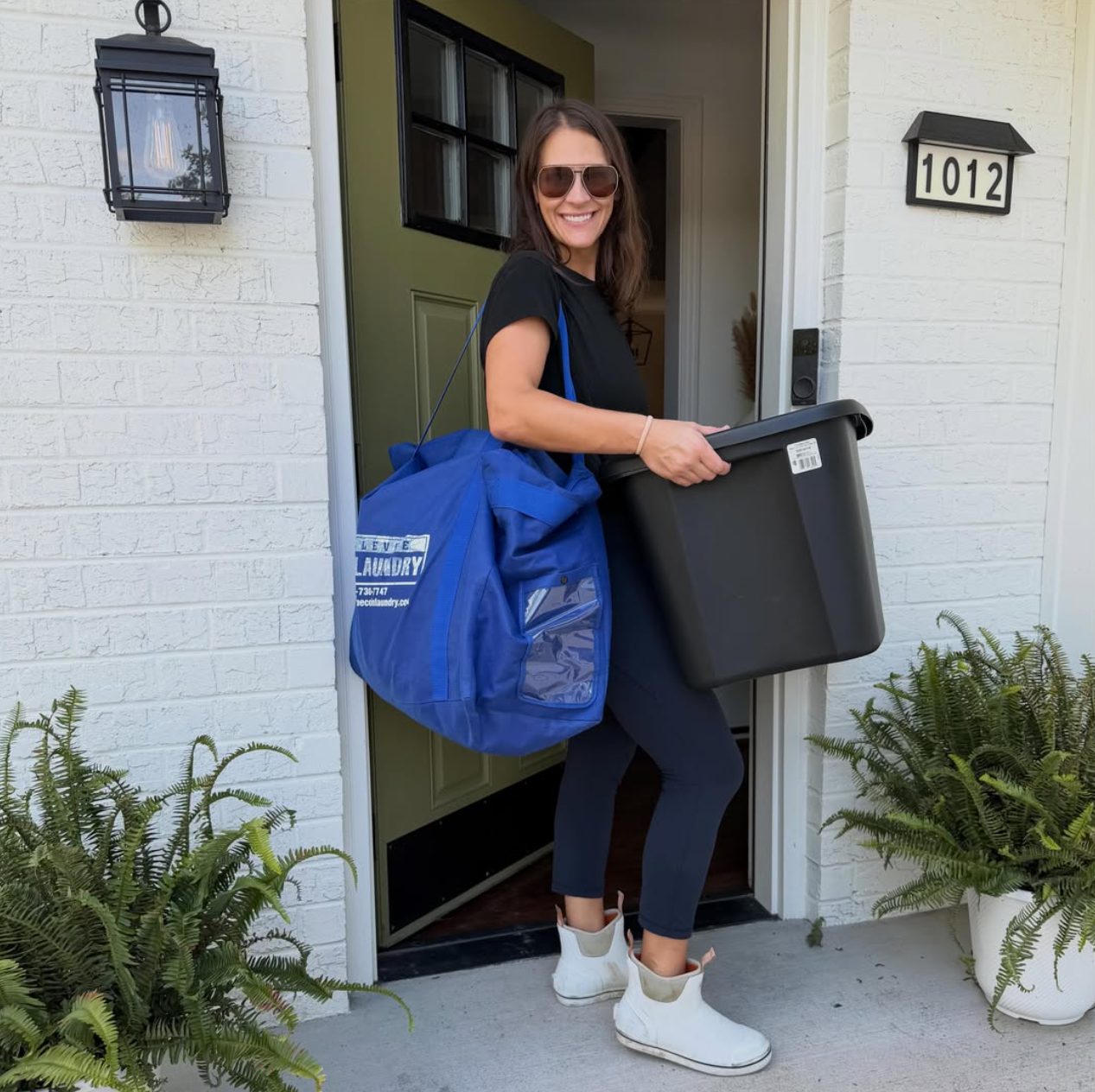 Picking up laundry at a customer's front door